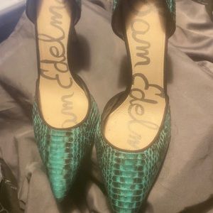 Green and black snake skin pumps